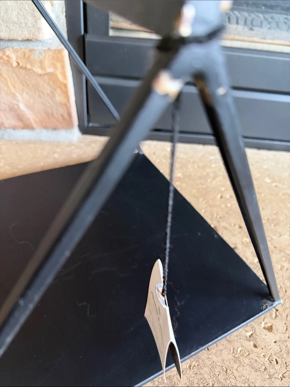 Hearth & Hand Black Metal Pyramid Log Holder & Carrier with Brass Handle Accent